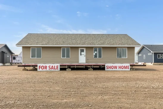 Single-level RTM show home for sale on lot, ready-to-move home built for delivery across Alberta and Saskatchewan